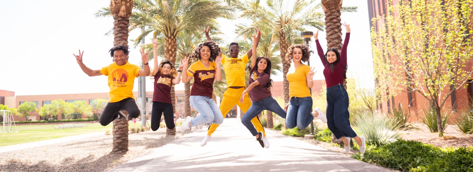 ASU students jumping for the camera