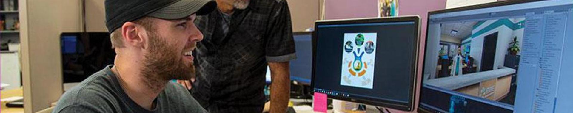 Person smiling while on a computer