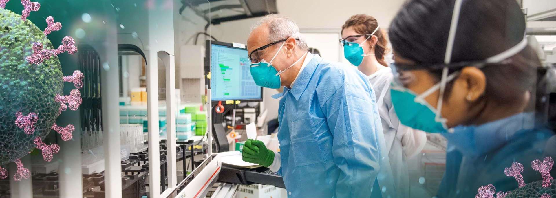 Three people in a lab wearing face masks