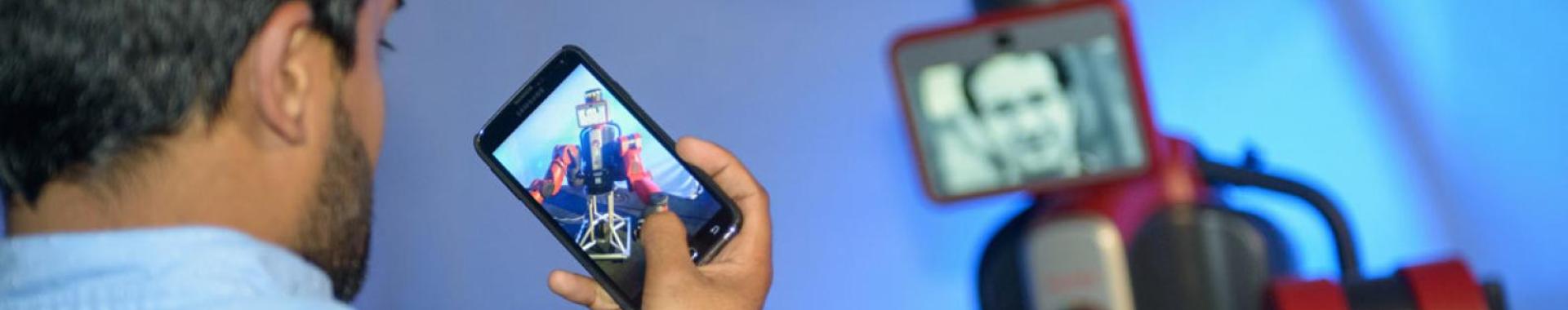 Person taking a photo on their phone